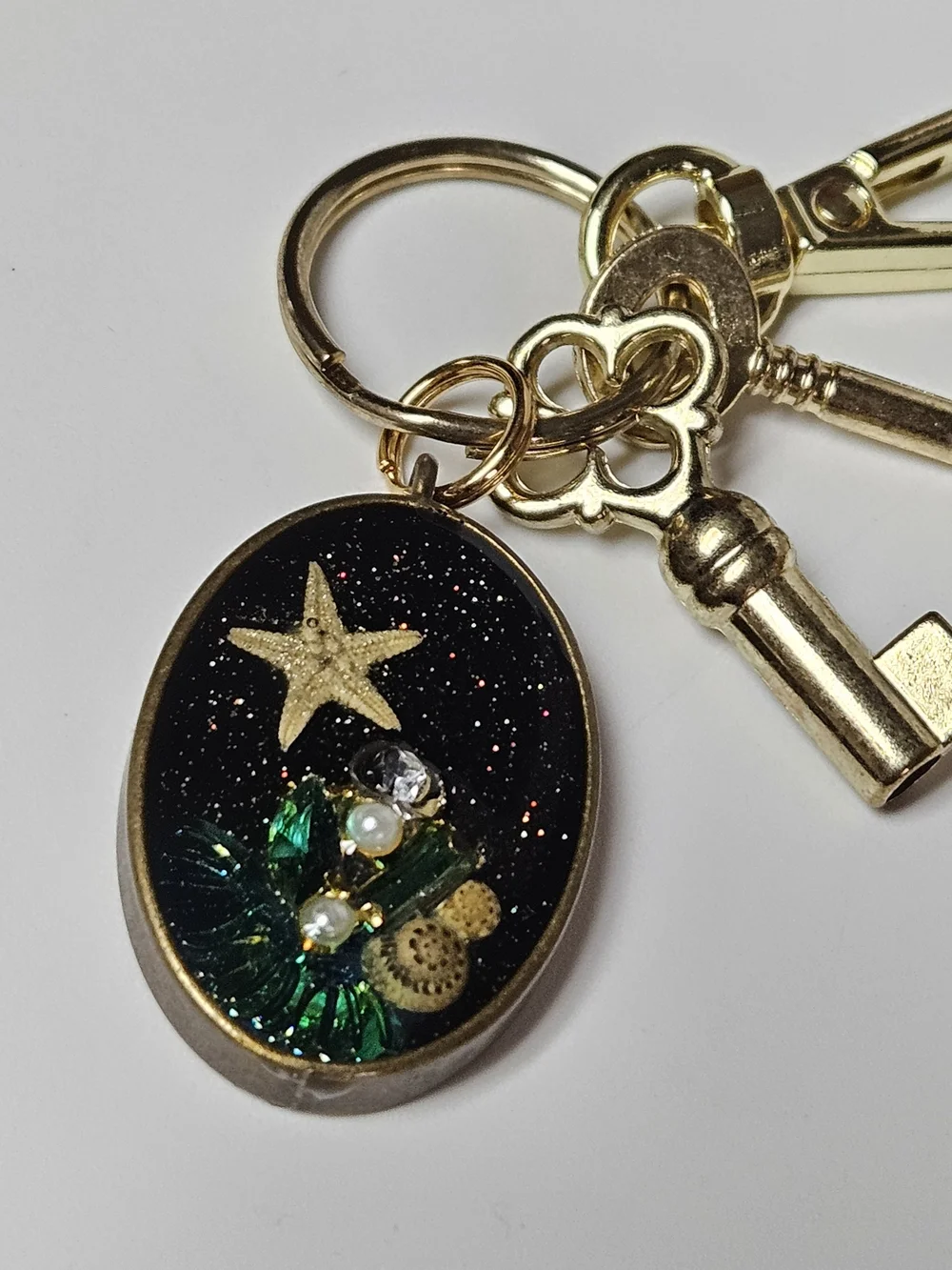 Gold-Tone Black Resin Starfish Keychain Bag Charm Green Jewel Accents